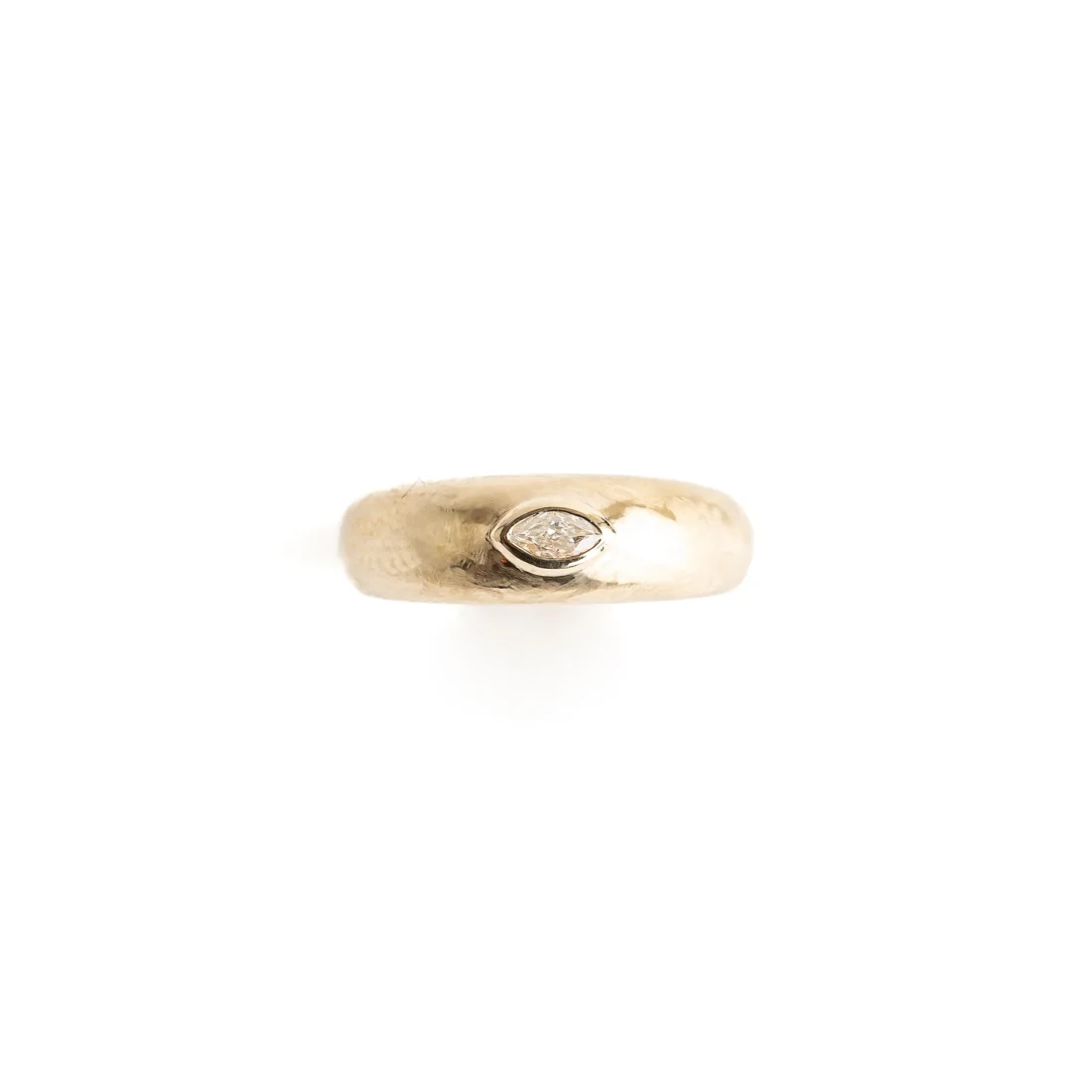 Gold band with flush-set diamond