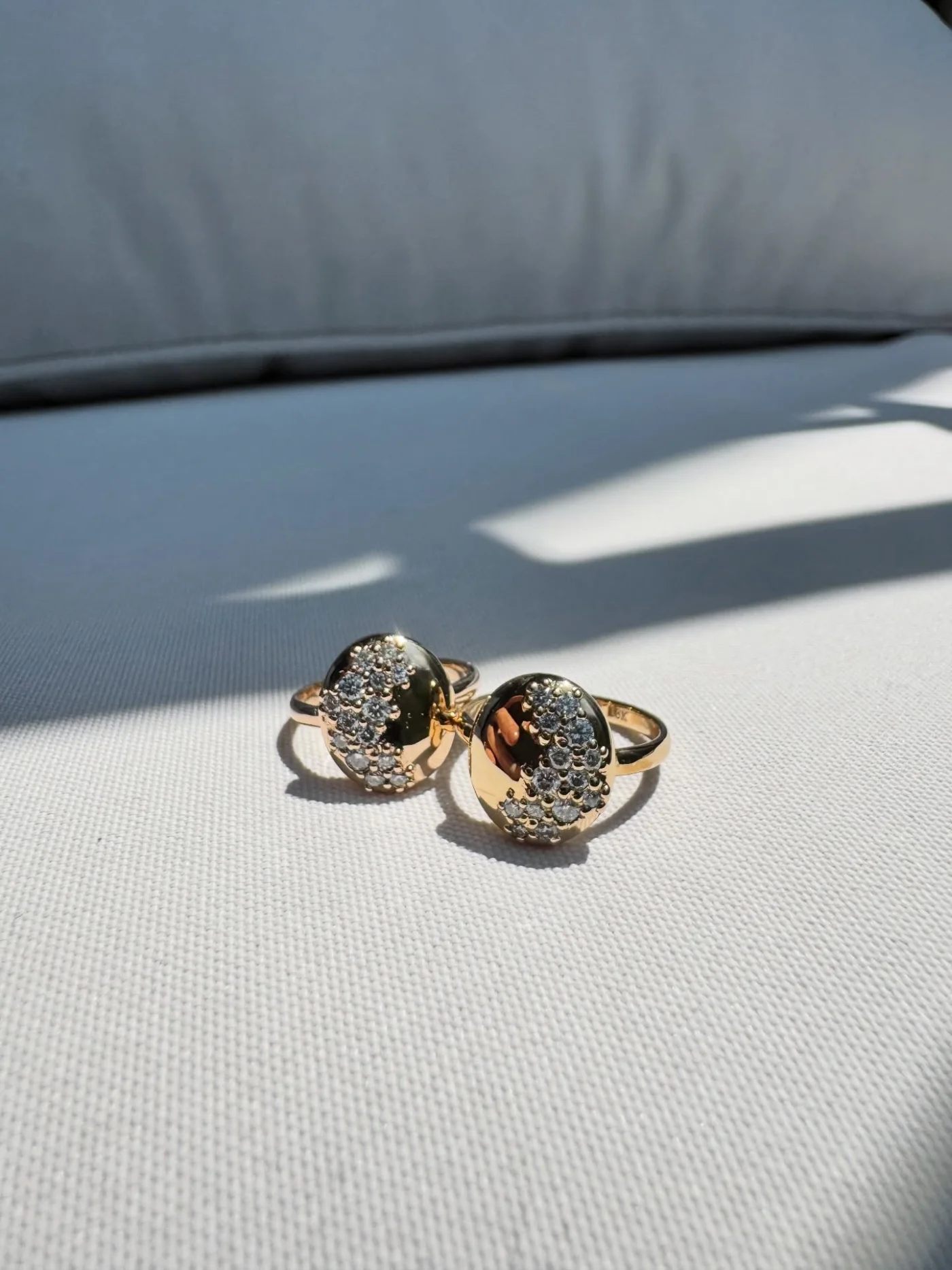 Pair of pave gemstone rings