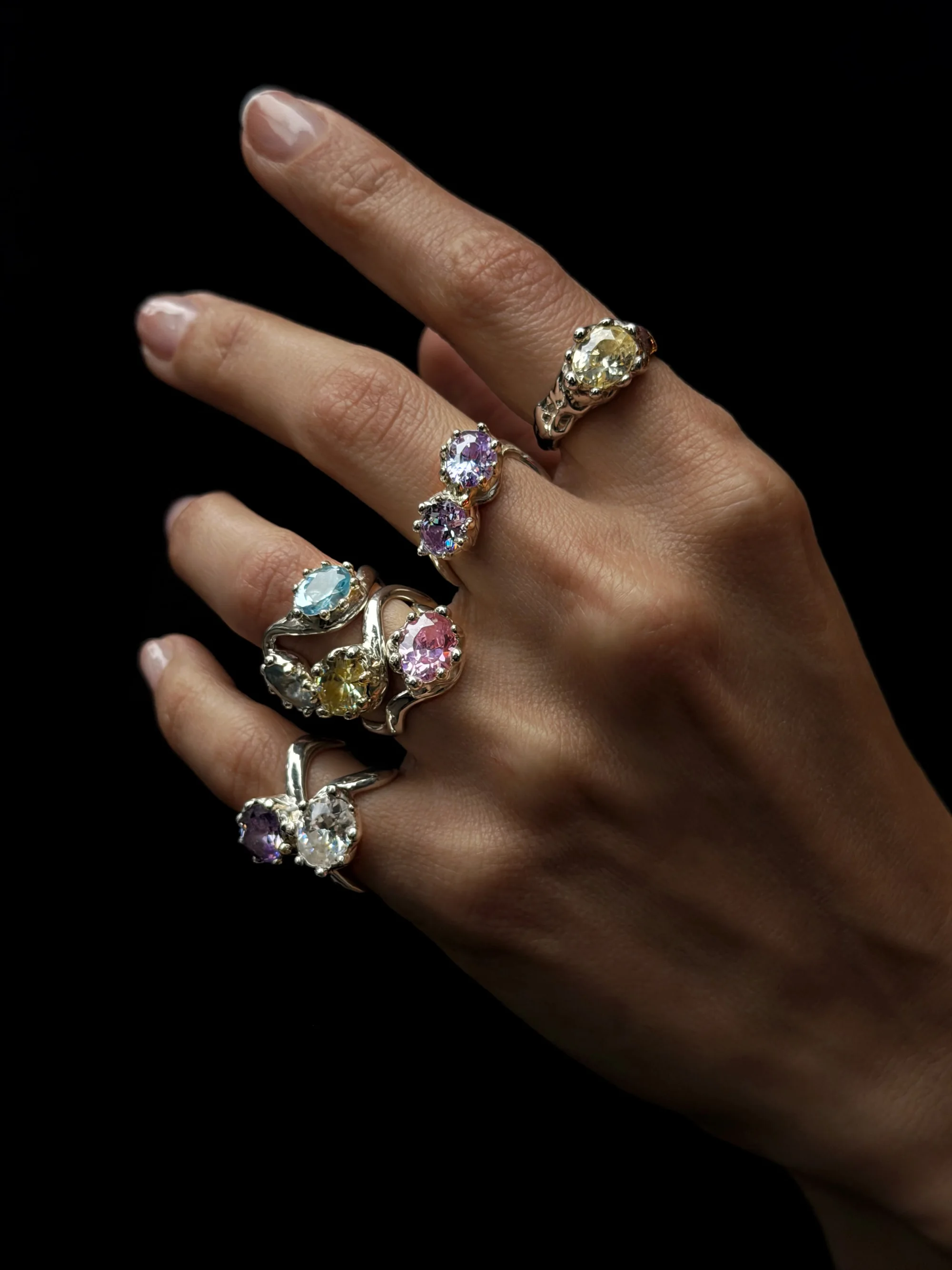 Tracy Reuss rings in colored gemstones and gold